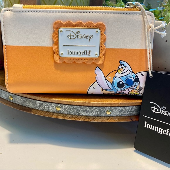 Loungefly Handbags - Loungefly Disney Orange and White Wallet